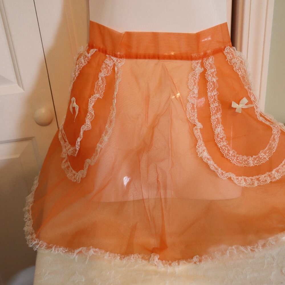 Adorable vintage sheer orange apron